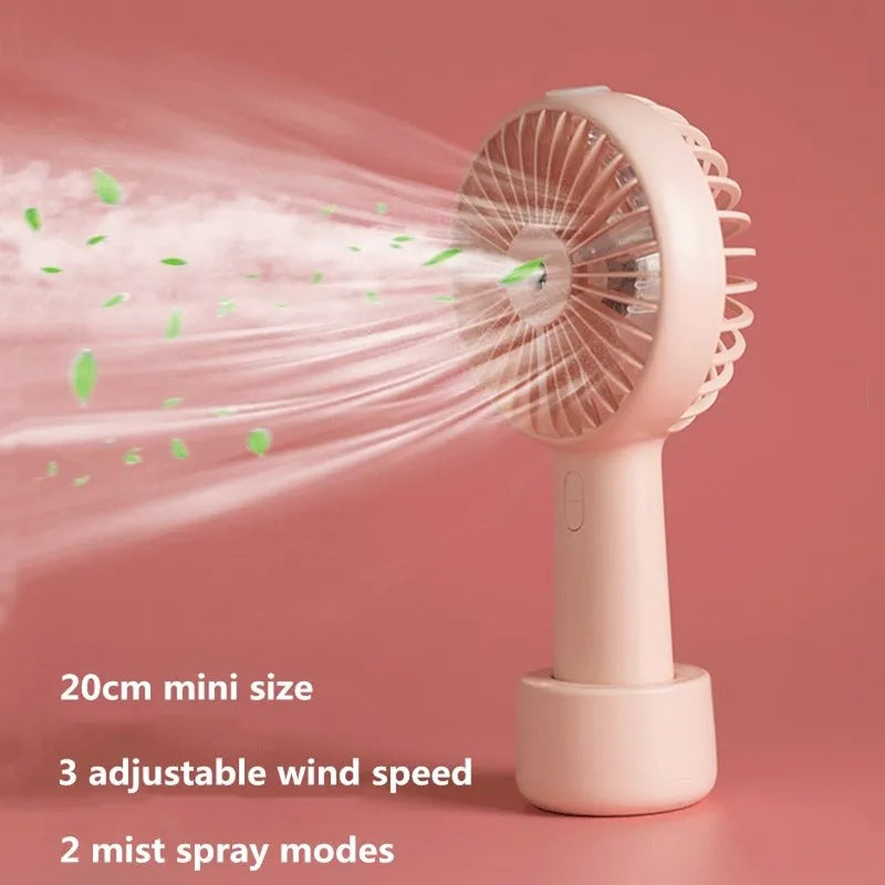 fan Battery-operated mist fan Portable water spray fan Handheld misting fan Rechargeable spray fan Travel-friendly mist fan Compact water misting device Battery-powered cooling fan Outdoor misting fan Mini portable spray fan Personal water spray fan Handheld misting cooling fan Portable misting solution Battery-operated water fan Compact misting fan On-the-go water spray fan