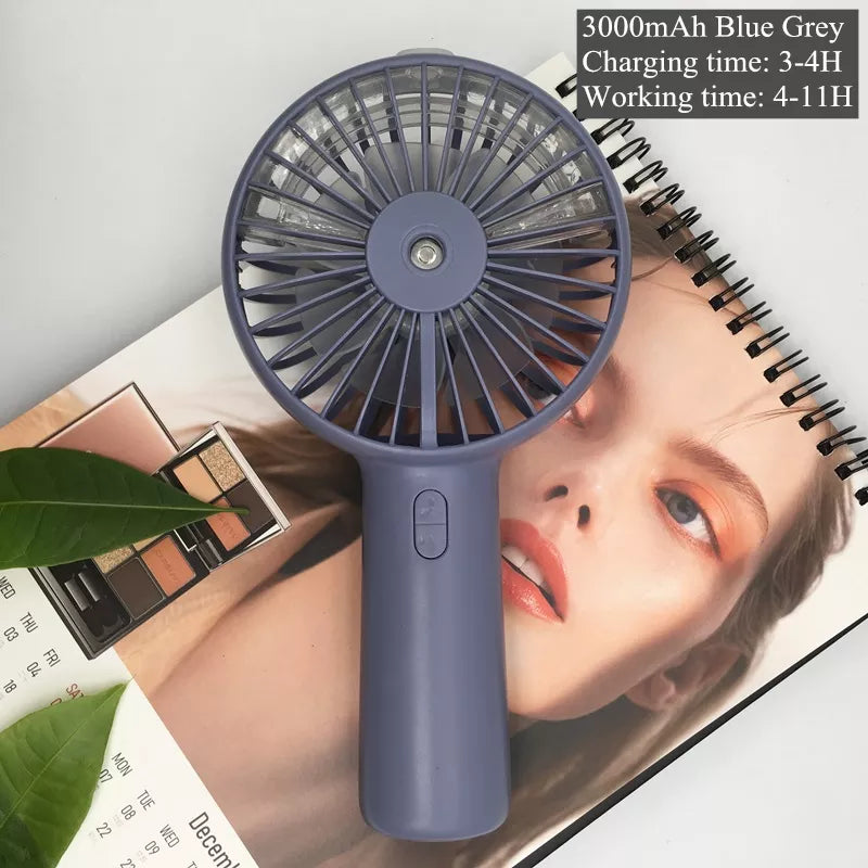 fan Battery-operated mist fan Portable water spray fan Handheld misting fan Rechargeable spray fan Travel-friendly mist fan Compact water misting device Battery-powered cooling fan Outdoor misting fan Mini portable spray fan Personal water spray fan Handheld misting cooling fan Portable misting solution Battery-operated water fan Compact misting fan On-the-go water spray fan