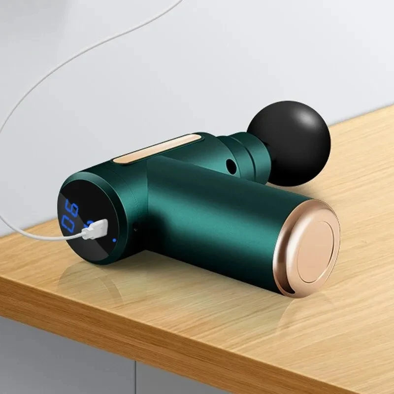 body massager  Electric vibration massage pistol  Massager with electric vibrations  Handheld vibration massage tool  Percussion massage pistol  Portable electric massager  Vibration therapy massager  Electric muscle relaxation pistol  Handheld vibrating massage device  Deep tissue massage pistol  Electric percussion massager  Vibrating massage gun  Muscle recovery massage pistol