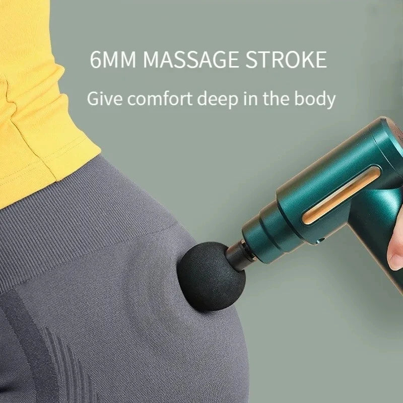 body massager  Electric vibration massage pistol  Massager with electric vibrations  Handheld vibration massage tool  Percussion massage pistol  Portable electric massager  Vibration therapy massager  Electric muscle relaxation pistol  Handheld vibrating massage device  Deep tissue massage pistol  Electric percussion massager  Vibrating massage gun  Muscle recovery massage pistol