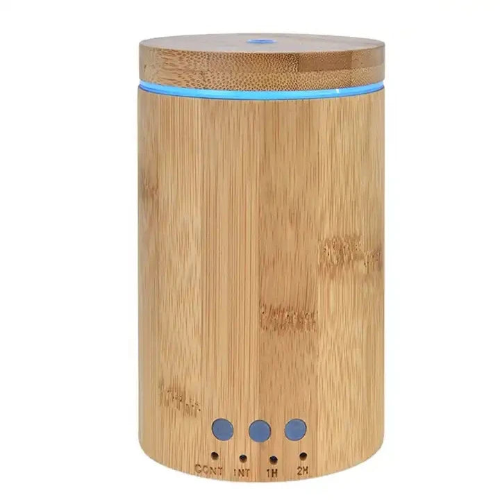 Humidifier  Air diffuser  Bamboo essential oil diffuser  Aromatherapy bamboo diffuser  Natural bamboo aroma diffuser  Decorative essential oil diffuser  Eco-friendly oil diffuser  Bamboo design aromatherapy device  Compact bamboo diffuser  Ultrasonic bamboo mist maker  Stylish essential oil diffuser  Bamboo-inspired aroma dispenser  Elegant bamboo oil diffuser  Quiet operation bamboo diffuser  Bamboo home fragrance diffuser  Eco-conscious aromatherapy tool  Modern bamboo essential oil diffuser